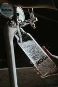 Sparkling carafe being filled